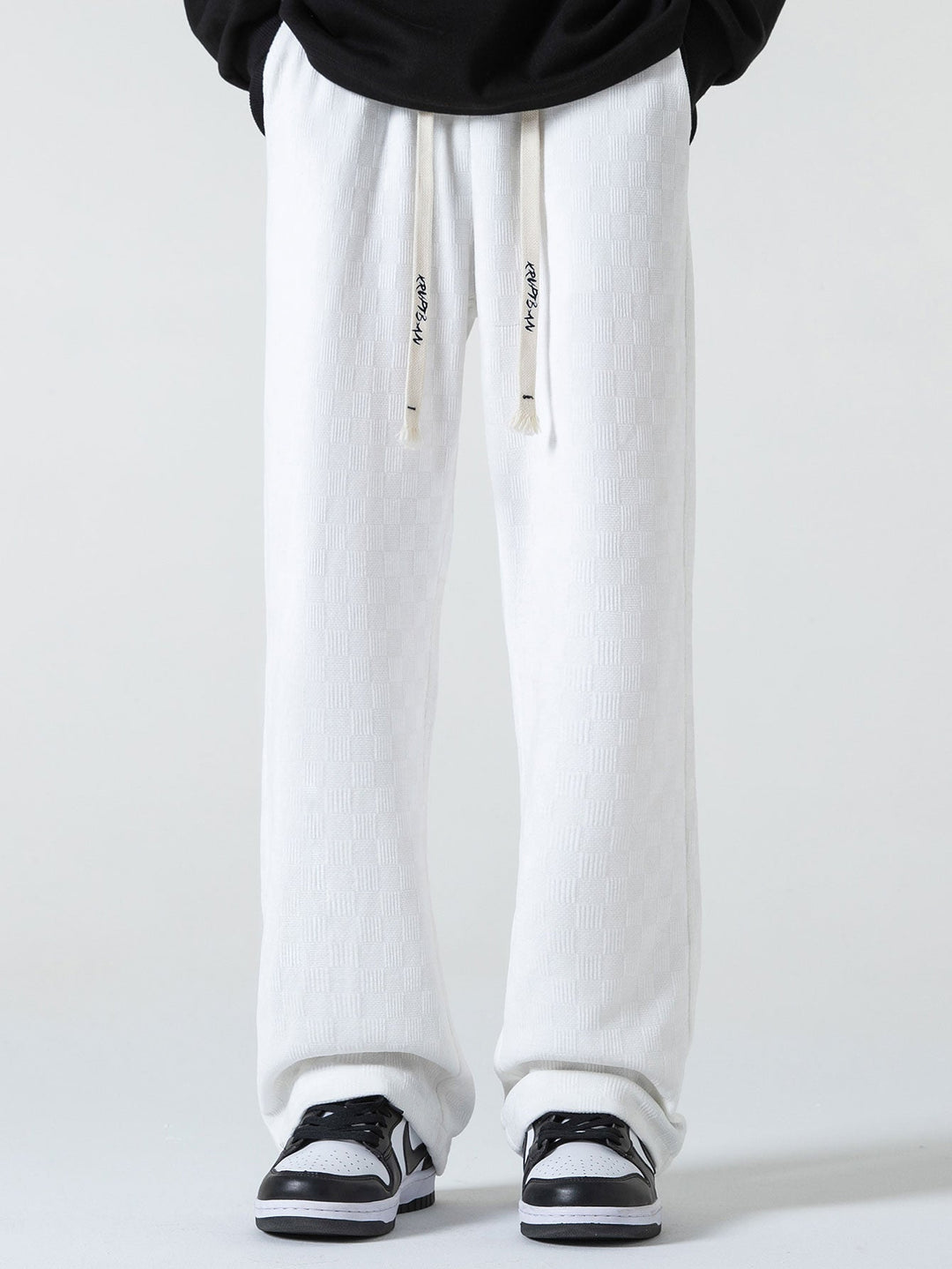 Calças de perna reta texturizadas em padrão xadrez