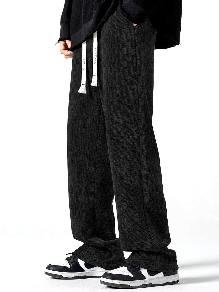 Calças de perna reta texturizadas em padrão xadrez