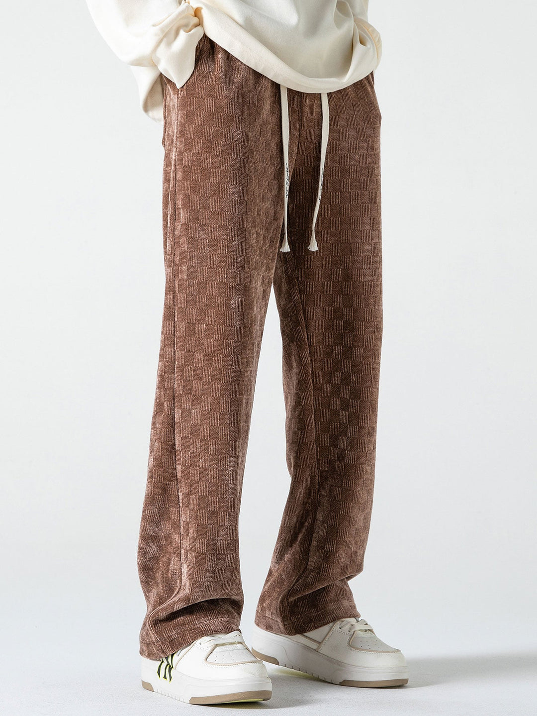 Calças de perna reta texturizadas em padrão xadrez